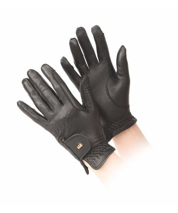 Fine, soft goat leather offers a comfortable riding glove with non-slip grip and a feminine fit. Unlined for closer contact, gusseted wrist openings with touch close fastenings, reinforced riding grips, stretch stitching.