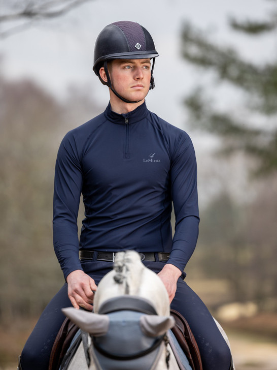 A classic base layer for active riders designed to keep you warm and comfortable with sweat-wicking thermal fabric whatever the season. The silky smooth anti-microbial material offers a stylish tailored fit. Ultra soft seams with flat-lock stitching reduce chafing and unwanted pressure point.
 

The 360 ، stretch fabrication allows greater mobility in any direction making the perfect clothing for riding and competing. The unique Moisture-Movement System of these garments actively takes sweat away from the skin and are designed to regulate body temperature & ensure optimum comfort.
 

Ideal as a base layer or stand alone sports garment