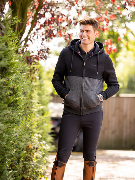 The Men’s Elite Zip Through Hoodie is comfortable, cool and classic.
 

This cut and sew colour block hoodie is made from super soft brushed, high quality fabric with soft ribbed cuffs and hem for maximum comfort.
 

Practical front pockets and considered subtle branding and a relaxed fit makes this piece perfect for everyday wear