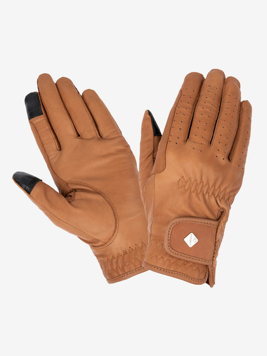 A timeless classic, the Pro Touch Classic Leather Riding Gloves are both stylish, comfortable, and highly functional whilst offering a sophisticated, modern look.


The soft feel and naturally breathable leather provides optimum grip, with integrated ventilation holes to deliver superb breathability and an excellent close contact fit.


These gloves are perfect for competition or schooling and are touch Screen compatible, with an anti-snag Velcro closure for the perfect comfortable wrist fit.