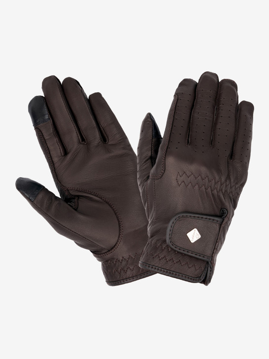 A timeless classic, the Pro Touch Classic Leather Riding Gloves are both stylish, comfortable, and highly functional whilst offering a sophisticated, modern look.


The soft feel and naturally breathable leather provides optimum grip, with integrated ventilation holes to deliver superb breathability and an excellent close contact fit.


These gloves are perfect for competition or schooling and are touch Screen compatible, with an anti-snag Velcro closure for the perfect comfortable wrist fit.