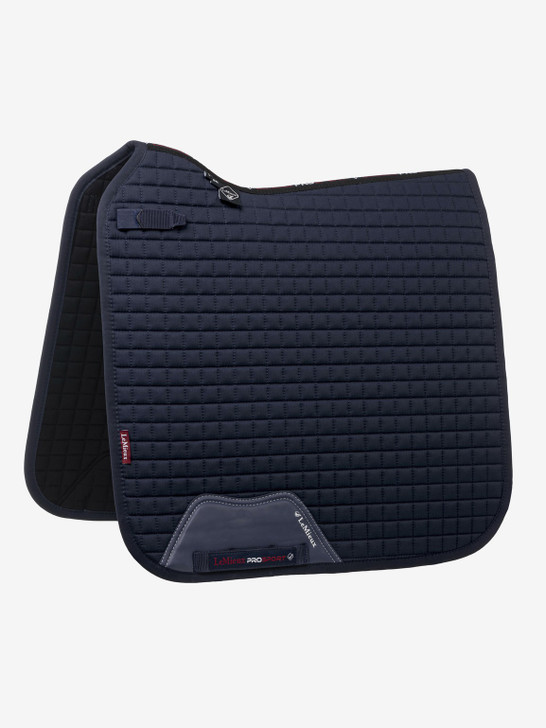 Range of plain squares that is anything but plain! Designed for the active horse, offering style, durability and maximum fabric performance. A number of innovative design features have been incorporated in this a fantastic pad.

New super soft Bamboo lining absorbs & controls sweat under the saddle, making it beautifully comfortable and secure - minimising friction.
Girth straps with optional inner locking loop to prevent slipping
D-Ring straps contoured to give better fit and allow breast plate attachments
High wither swan neck design for freedom at the wither.
Signature girth protection area for added strength.


These top end designed pads are ideal for everyday or competition use. They also look great when combined with a Lemieux Half Pad creating a very smart look.