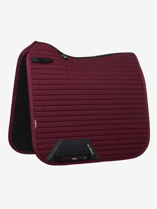 Range of plain squares that is anything but plain! Designed for the active horse, offering style, durability and maximum fabric performance. A number of innovative design features have been incorporated in this a fantastic pad.

New super soft Bamboo lining absorbs & controls sweat under the saddle, making it beautifully comfortable and secure - minimising friction.
Girth straps with optional inner locking loop to prevent slipping
D-Ring straps contoured to give better fit and allow breast plate attachments
High wither swan neck design for freedom at the wither.
Signature girth protection area for added strength.


These top end designed pads are ideal for everyday or competition use. They also look great when combined with a Lemieux Half Pad creating a very smart look.