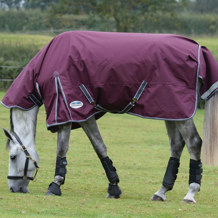 Comfortable, durable, remarkable value. The WeatherBeeta ComFiTec Plus Dynamic II Combo Neck Medium comes packed with great features, including a super strong and durable 1200 denier triple weave outer shell with repel shell coating that is both waterproof and breathable, memory foam wither relief pad that contours to the horse's shape and lifts the rug off the wither to reduce rubbing and provide added comfort, quick clip front closure offering maximum adjustability and is compatible with the WeatherBeeta liner system. This rug also offers 220g of polyfill which is easily identified with the WeatherBeeta temperature gauge badge, also featuring an extra large tail flap for maximum protection, reflective strips on front each side and tail flap for extra visibility, traditional side gussets for natural movement, twin low cross surcingles and elasticated, adjustable and removable leg straps for a secure and comfortable fit. Hydrostatic Pressure Tested to 2000mm plus. Moisture+H241:J259 Vapour Tested to 3000g/m2