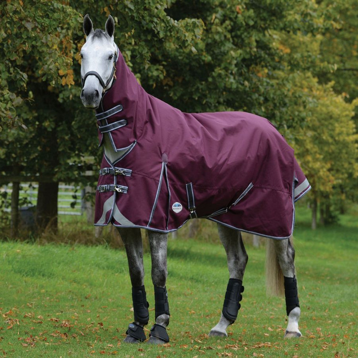 Comfortable, durable, remarkable value. The WeatherBeeta ComFiTec Plus Dynamic II Combo Neck Medium comes packed with great features, including a super strong and durable 1200 denier triple weave outer shell with repel shell coating that is both waterproof and breathable, memory foam wither relief pad that contours to the horse's shape and lifts the rug off the wither to reduce rubbing and provide added comfort, quick clip front closure offering maximum adjustability and is compatible with the WeatherBeeta liner system. This rug also offers 220g of polyfill which is easily identified with the WeatherBeeta temperature gauge badge, also featuring an extra large tail flap for maximum protection, reflective strips on front each side and tail flap for extra visibility, traditional side gussets for natural movement, twin low cross surcingles and elasticated, adjustable and removable leg straps for a secure and comfortable fit. Hydrostatic Pressure Tested to 2000mm plus. Moisture+H241:J259 Vapour Tested to 3000g/m2