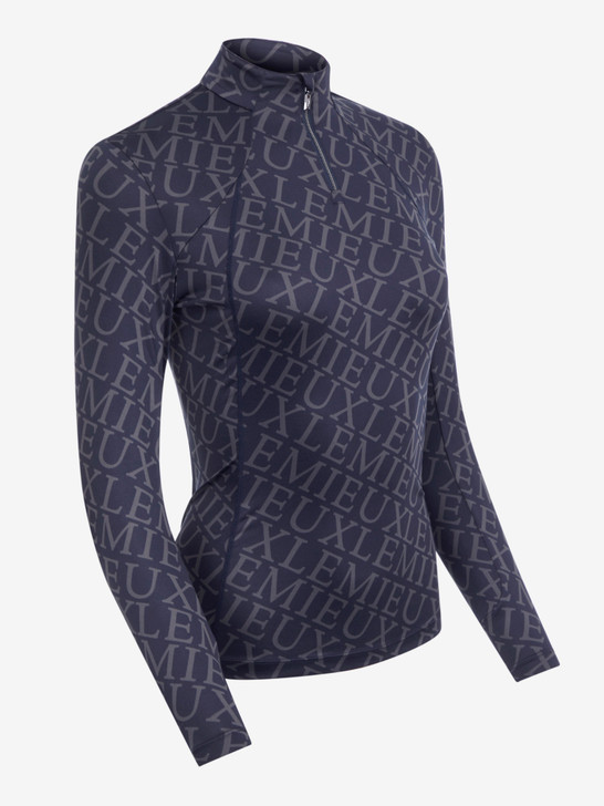 Add a touch of luxury to your riding wardrobe with our Fleur Base Layer. Finished with a striking all-over LeMieux print, this comfortable layer features movement-enhancing 360° stretch for unrestricted freedom, whatever the activity.

The form-fitting shape, ultra-soft seams and flat lock stitches reduce bulk and prevent chafing while you move, making it easy to layer under fleeces, jackets and gilets. If you're wearing it as a stand-alone sports layer, 30+ UV protection will protect you on sunny days.