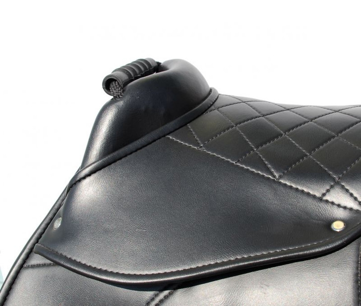 This Child's synthetic cub saddle is designed to help put the young rider in the correct position and help them feel confident in the saddle whilst being super light making it an excellent first saddle. It features a moulded handle at pommel for security, contrast stitching on seat for added grip and eye-catching finish, crupper D-ring, mono flap design with long eyeleted girth straps below leg flap for close contact, stainless steel stirrup bars and touch tape pads underside for width adjustment.