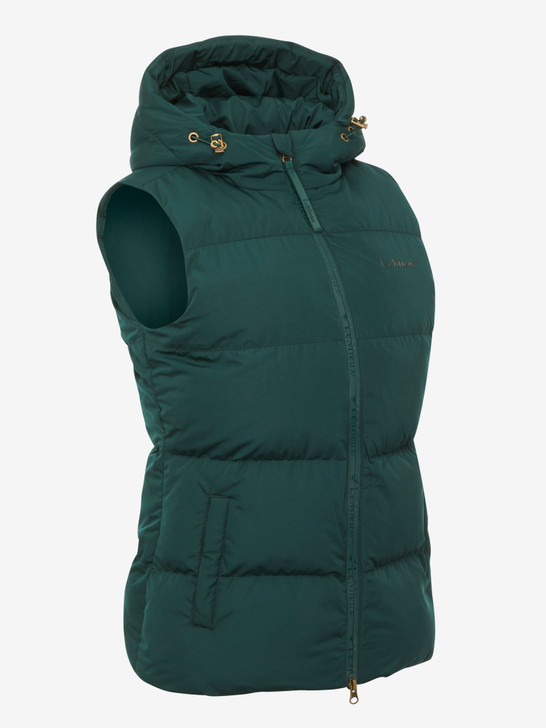 Cold days call for the women's Kenza Puffer Gilet. Blending style with function, it's the perfect layer to throw on over fleeces, hoodies, thermals and base layers.

Luxuriously warm, this gilet is filled with sustainable, eco-friendly DuPont padding. It's just as warm as down, but it's lighter and doesn't get heavy when wet. Plus, it has the same bounce-back durability of cotton, which means it retains its shape – even after washing.

There are fleece-lined pockets for keeping hands warm and an adjustable hood that can be altered to suit your shape. The two-way zip ensures complete freedom and flexibility while leaving your saddle safe from scratches.

Choose from a selection of stylish colours to co-ordinate your horse riding wardrobe.