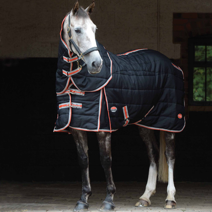 The WeatherBeeta ComFiTec Channel Quilt With Therapy-Tec Detach-A-Neck is the perfect choice for your horse both pre and post workout or whilst your horse is resting in the stable. Therapy Tec is designed to increase your horse's muscle function to reduce the risk of injury whilst warming up, by preparing the muscles for exercise. Also assists with recovery after work by reducing lactic acid build up which can decrease recovery time and improves the healing process of prior injuries. With a 600 denier channel quilted outer, warm 220g polyfill; ceramic lining over the neck, shoulders, back and quarters; traditional side gussets for natural movement; memory foam wither relief that contours to the horse's shape & lifts the rug off the withers; Ezi-clip front closure with touch tape, quick and easy to use; low cross surcingles and tail cord. *Not recommended for in foal mares.