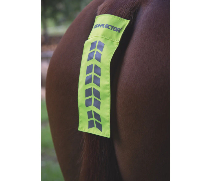 For rear visibility on the road, the EQUI-FLECTOR reflective tail strap helps keep the horse visible even from a distance. Held in place with a rubberised elastic strap and touch close fastenings. Part of the EQUI-FLECTOR range of bright, reflective garments for horse and rider.