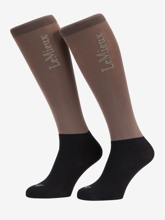 New lightweight ultra close contact riding socks from LeMieux. Seamless low profile fabric offers compression that enhances the fit of long boots. Socks to be worn and not thought about.