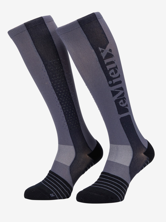 Designed for maximum comfort and peak performance, these technical performance socks are the pinnacle of any riding wardrobe.
 

The padded foot and arch offers all the support you need, while a diamond print silicone grip on the inside of the calf keeps these performance-enhancing socks in place, whether worn over or under breeches and riding boots.