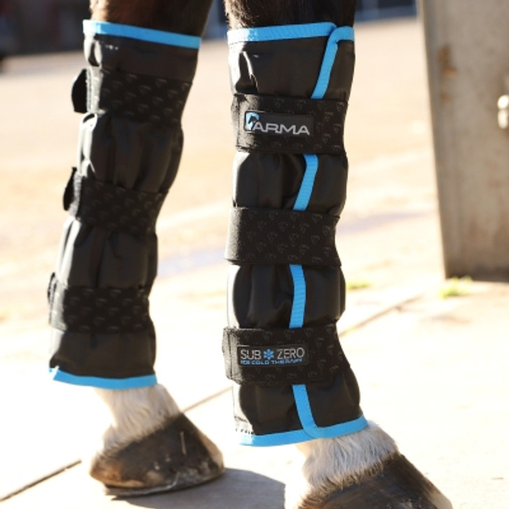 ARMA SubZero Ice Boots use cryotherapy ice cold therapy which reduces blood flow to the treated area, helping to speed up recovery. Useful in daily remedial management, post exercise extreme cold therapy is also helpful for treating acute injury; reducing the inflammatory response and for analgesic benefit to reduce pain. Quick and easy to use and suitable for any area of the horse leg. Chill boots in the freezer to activate the gel and use immediately or store in a cool bag if using out and about. Wrapped around the affected area of the leg, the 32 gel cushions in each boot conform to the leg shape for full coverage, quick close elastic straps secure the fit. Suitable for use on the front or hind legs. Set of 2.
