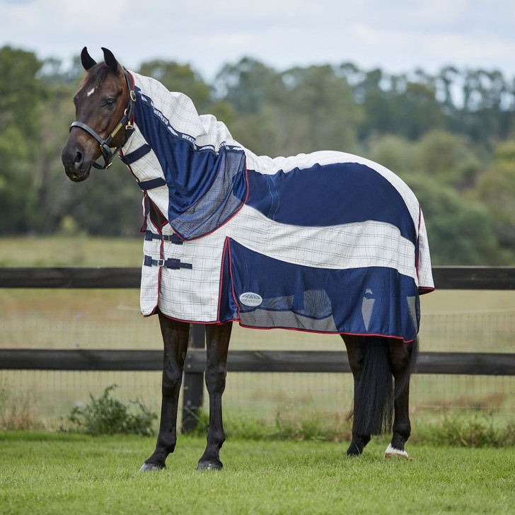 The WeatherBeeta Breeze With Surcingle IV Combo Neck horse rug offers a breathable and cool 270g polycotton upper providing 95%+ UV protection for your horse with polyester mesh panels for ultimate in airflow for the warmer spring and summer months. The shaped back panel has been designed to better fit the curve of your horse's back. This summer horse rug also features a wither relief pad for additional comfort, reducing pressure and rubbing in the wither area, and 210 denier lined shoulders, mane and tail flap to prevent rubbing. As well as three touch tape closures on the neck and traditional side gussets to allow for natural movement The full wrap tail flap offers maximum protection with a two piece design that wraps around your horse's quarters, a twin web buckle chest strap, adjustable hidden surcingle, reflective binding and badge for extra visibility and elasticated and removable leg straps.