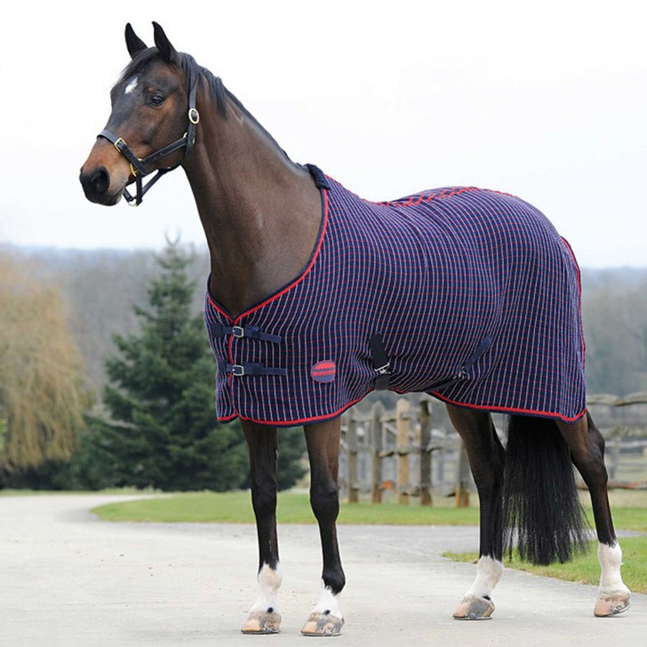 The WeatherBeeta Waffle Cooler Standard Neck features waffle woven fabric which is both breathable and wickable keeping your horse comfortable and dry. Features include adjustable buckle front closure, boa fleece at the wither for additional comfort, low cross surcingles and a tail cord. Ideal for travelling or cooling after exercise.