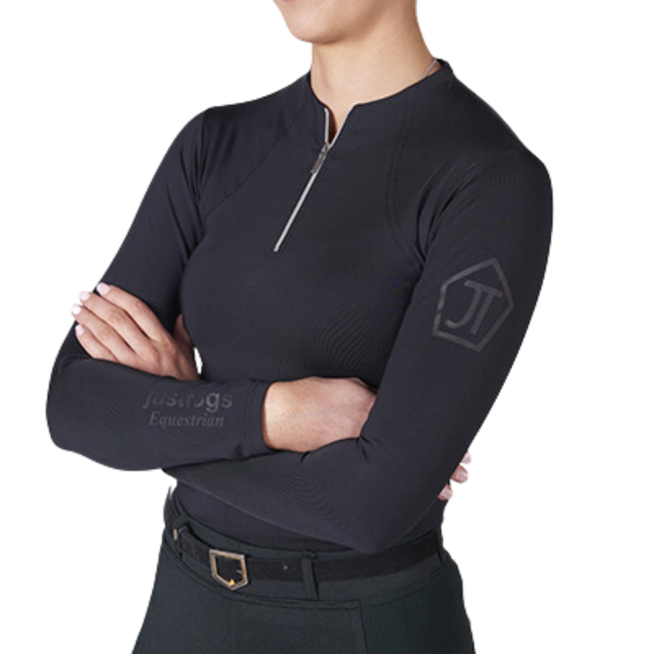From chilly mornings to a full workout This top does it all Designed specifically with the equestrian in mind with its comfortable stretch fabric and moisture wicking properties make this perfect to wear on its own or to use as a layer on those cooler days Features subtle branding on the arms its a must have in any equestrians wardrobe for any time of year Match with the Just Tights.