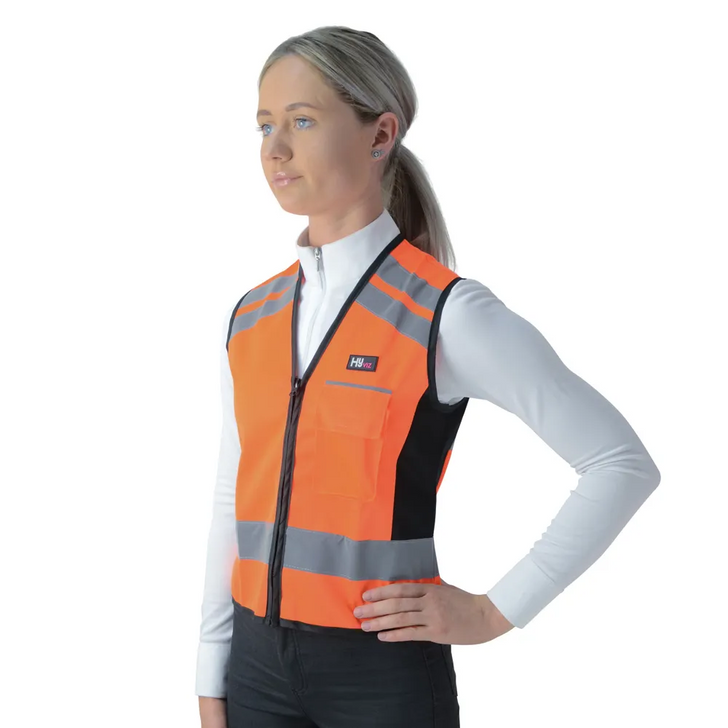 Stylish HyVIZ Waistcoat with PLEASE PASS WIDE & SLOW printed on the back. CE marked. Certified to EN1150. Breathable fabric, with zip fastening to the front and a pocket for your mobile phone. Elegant cut for a flattering fit. Fluorescent with silver reflective tape for style and safety, front and back. All year round visibility. Machine washable at 40ºC.