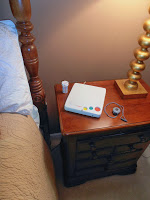 medical alert device on nightstand