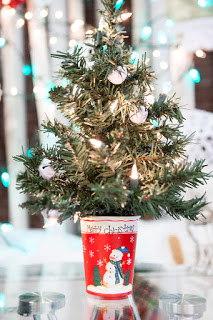 Small Christmas Tree on a table is a fun idea.