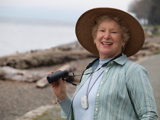 elderly person with fall device outdoors