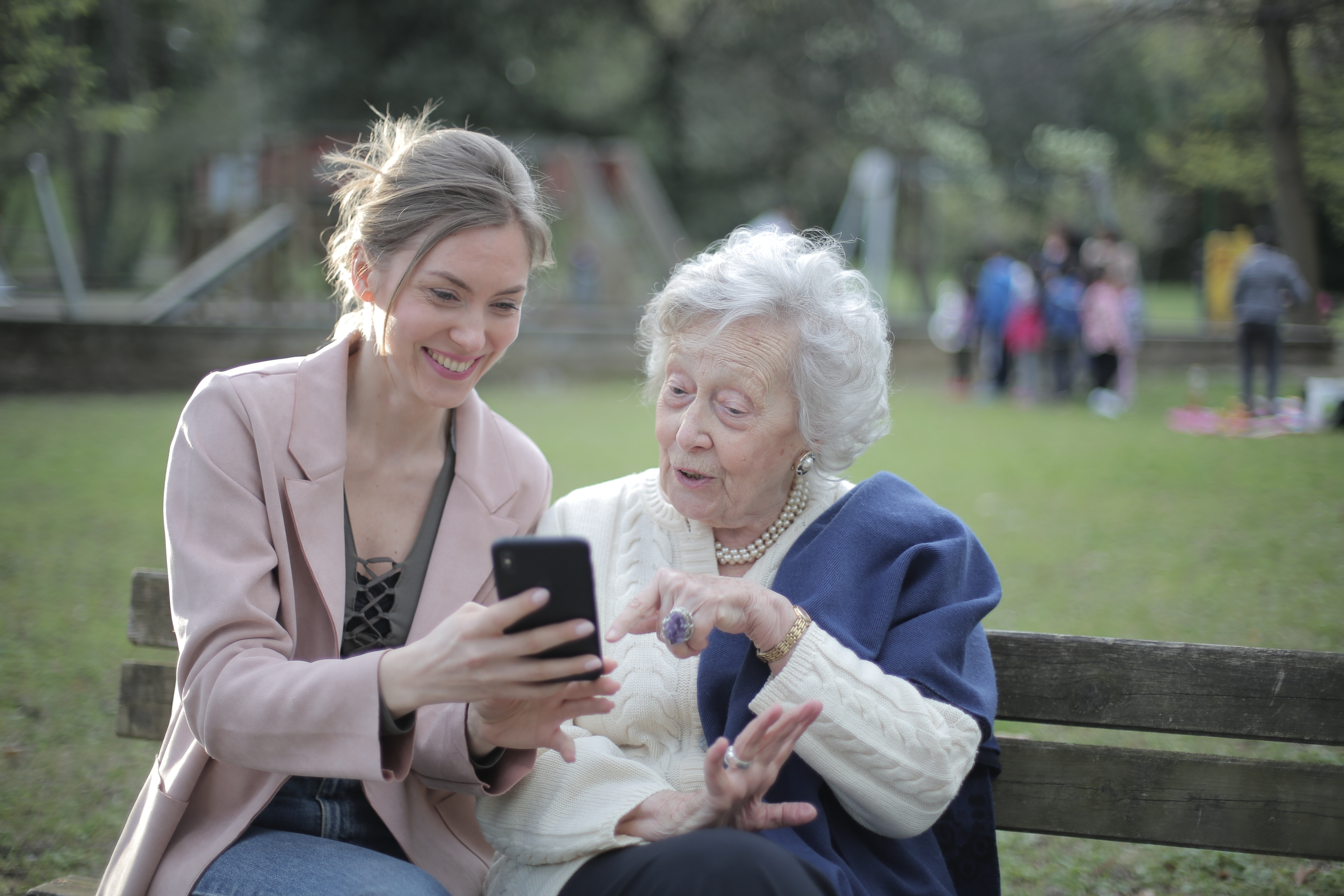 elderly mother with daughter on phone