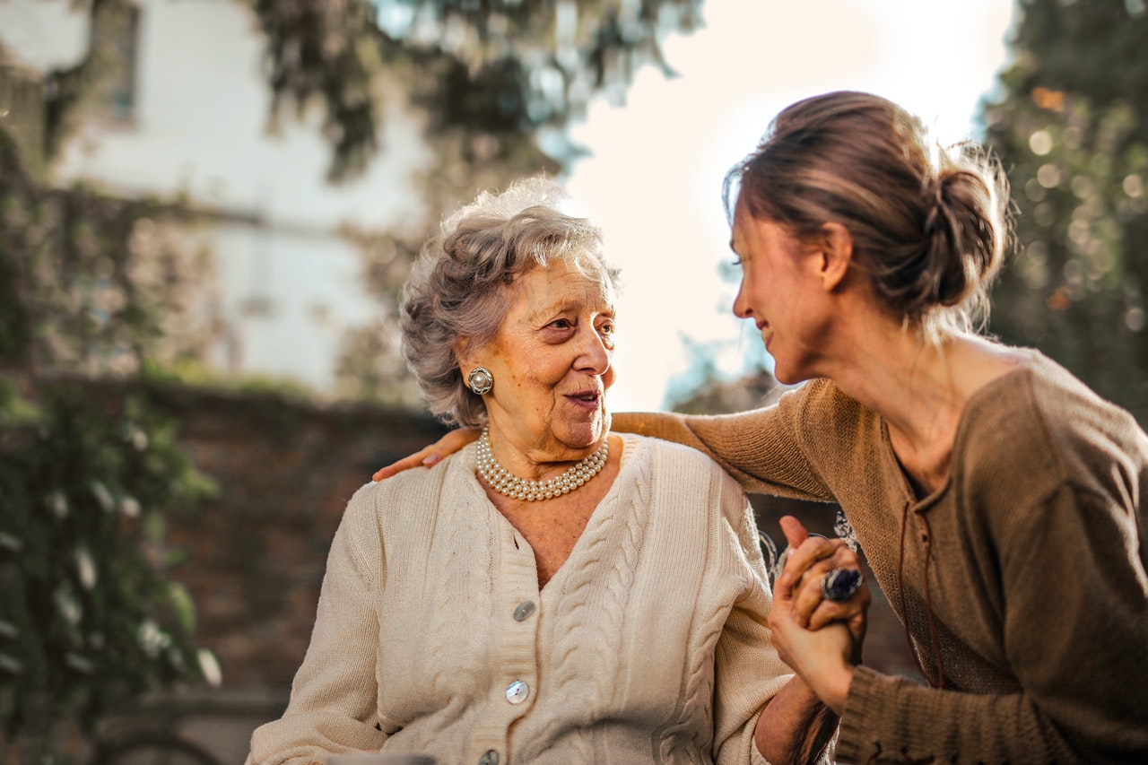 elderly-woman-with-daughter-in-park.jpg