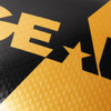 Revgear Pinnacle Boxing Gloves in gold and black, showcasing the glove's slimline design and wrist closure