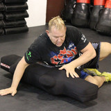 Revgear Motion Master Grappling Dummy by Erik Paulson, full view of the dummy in a grappling position