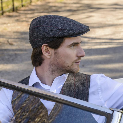 Men's Irish Flat Cap Trinity Tweed Charcoal Herringbone on a model Keilys.com