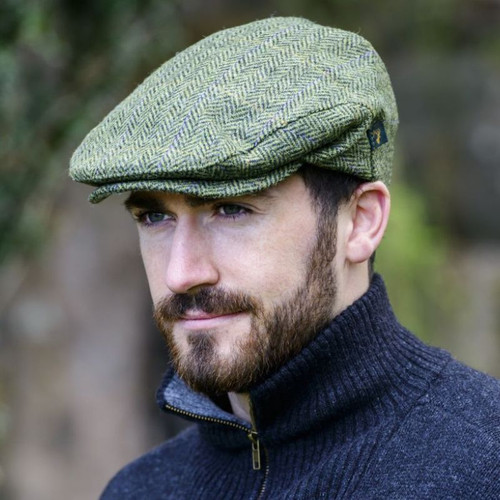 MUCTRIN01 Mucros Weavers Tweed Trinity Flat Cap Green Herringbone Side view Keilys.com