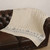 B660510 Wool Knit Sailing Boat Throw Natural White Color On a Sofa Keilys.com