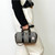 ISL-8823BLWDT00 Handwoven Harris Tweed Mini Duffel Bag Black and White Dogtooth Color Shop online On Keilys.com