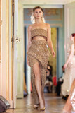 Strapless Cut-Out Peplum Gown