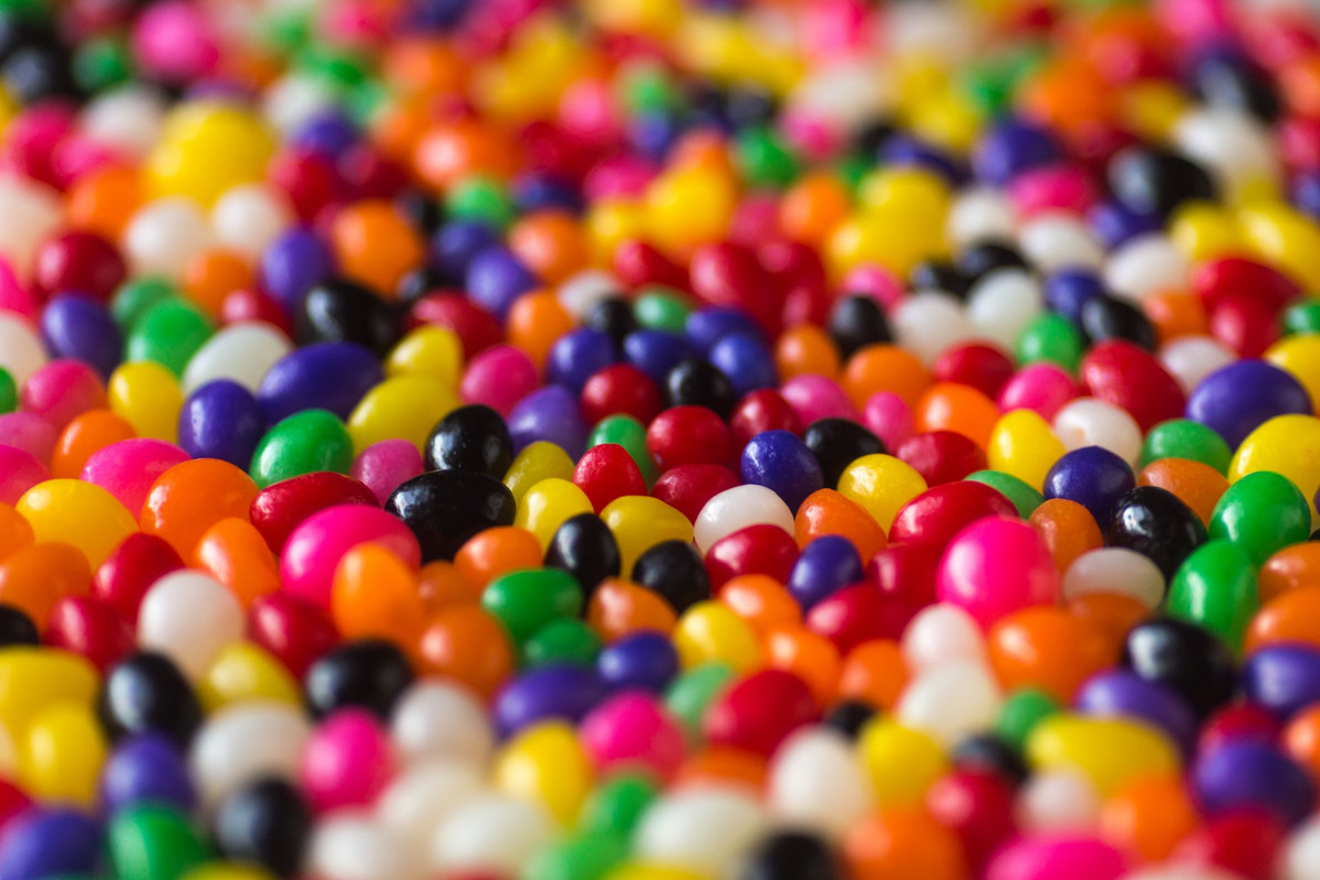Pile Of Colorful Candy Is Sitting On Top Of A Black Surface Background  Picture Of Nerds Candy Background Image And Wallpaper for Free Download