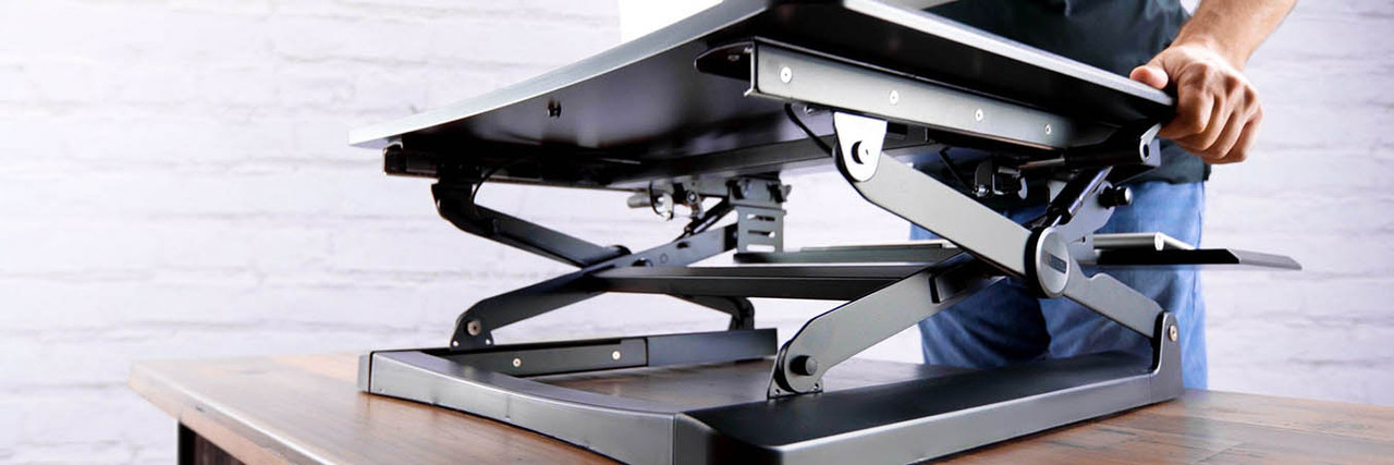 Standing desk converters work with your current setup