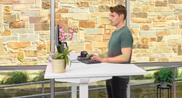 The sloped ergonomic edge of the curved corner desktop improves wrist comfort when typing
