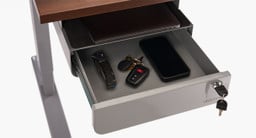 Store mobile devices, keys, wallets, and more in the securely locked drawer