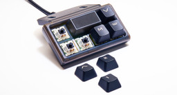Cherry-style mechanical switches and customizable keycaps provide a real gaming keyboard feel to the RGB Gaming Keypad