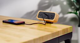 The zero-footprint design of the DuoMount clamps to the edge of the desk to save valuable desktop real estate