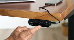 Adjust your desk's height with a single press of a button