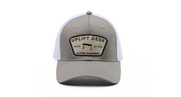 Gray UPLIFT Desk Cap featuring an 'Altitude Adjustment' patch