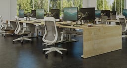 Create a clean and aesthetically pleasing end cap to desk rows. Material shown: Kensington Maple