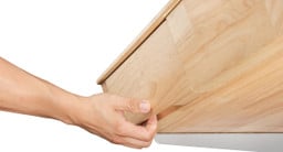 The Craft Table's drawers are easy to open and close thanks to ball-bearing slides and a contoured hand grip under each drawer face