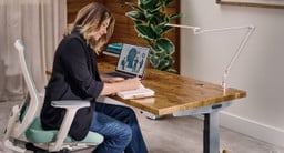 Select a Solid Wood desktop for your standing desk for a natural look with character and add an LED Desk Lamp E7 to illuminate your workspace