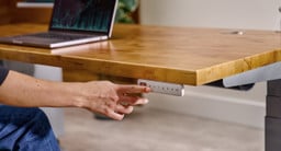 Grey Advanced Comfort Flush Keypad on an UPLIFT height adjustable desk.