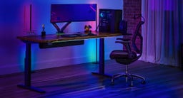 UPLIFT V3 Standing Desk with a Saman Butcher Block desktop and a J3 Ergonomic Chair