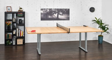 The adjustable height conference table frame travels from 24.5" up to 50.1" with the 1" thick top for ideal sitting and standing heights