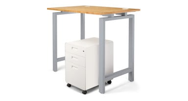Side table frame provides room for file cabinets and other storage accessories without sagging or instability