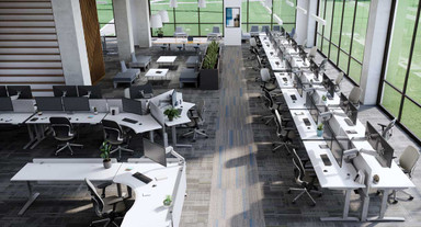 [On right] Power & Data Rail with White Laminate Standing Desks arranged in a Dual Sided Row configuration