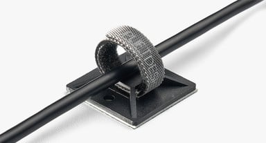 Cable wraps and adhesive cable mounts keep wires bundled and tucked away